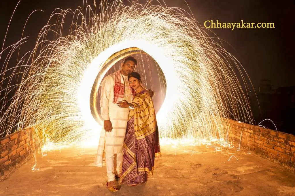 Dramatic night pre wedding photoshoot with colorful smoke and romantic dip pose